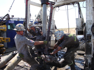 Oil Rig Roughnecks at work 